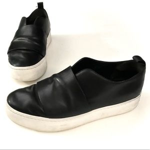 VINCE black leather slip on tennis shoes. Size 8.